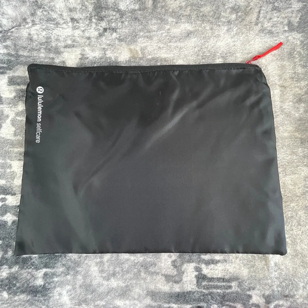 Lululemon Self Care Pouch Black Nylon Red Interior Travel Organizer Pouch NWOT